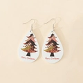 Detail of wooden teardrop earrings with a festive Christmas tree pattern and Merry Christmas text - Plaid Patchwork Christmas Tree Style (9)