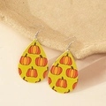 Faux leather teardrop earrings featuring orange pumpkin prints on yellow background - Yellow Base Orange Pumpkin Style