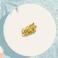Detailed golden dragon head charm bead showing intricate scales and zodiac craftsmanship - Gold