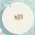 Detailed macro view of vintage gold and silver dragon head spacer bead for jewelry - Silver