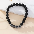 Handmade beaded bracelet with matte black natural stones and eye-patterned beads - Matte Stone