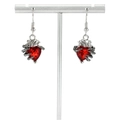Gothic heart earrings with red crystal held by skeleton claws on a metal jewelry stand - Skeleton Hand Heart Style