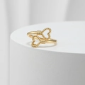 Golden open ring with intertwined double heart design and twisted rope texture on a white stand - Heart Gold