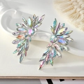 Detailed macro view of large wing-shaped alloy stud earrings with colorful AB rhinestones - Silver Iridescent