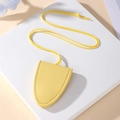 Close-up of bright yellow litchi grain leather glasses holder necklace with fine stitching - Bright Yellow