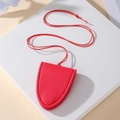 Red lychee grain leather glasses holder necklace with matching lanyard on white steps - True Red