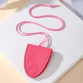 Detailed close-up of pink litchi leather clochette necklace with fine stitching and long cord - Rose Red