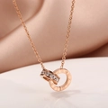 Rose gold interlocking double ring necklace with zircon pavé and Roman numerals - Roman Numeral Double Ring Style (8893) / Rose Gold