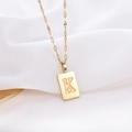 Minimalist 14k gold titanium steel necklace with K letter rectangular pendant on silk - Gold