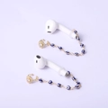 Détail de la chaîne anti-perte pour écouteurs avec perles œil bleu et clip oreille cristal - Mauvais Œil Bleu (NCE03775)