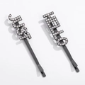 Detail of gunmetal hair clip set with sparkling rhinestones spelling just and HELLO - Just Hello Style (NXF00031)