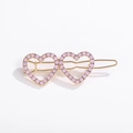 Fermaglio per capelli in metallo dorato con due cuori cavi e strass rosa su bianco - Stile Doppio Cuore Oro con Strass Rosa (NXF00052-1)
