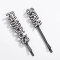 Détail de l'ensemble de barrettes FAMOUS et STAR avec strass blancs scintillants - Style Famous Star Noir (NXF00034)
