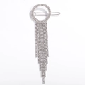 Silver rhinestone tassel hair clip with geometric circular design and long fringe strands - Nxf00039
