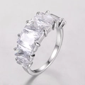 Elegant silver band ring with five radiant rectangular cut zircon stones in a prong setting - 16 / White Gold
