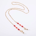 Elegant gold link glasses chain with red oval beads and secure lobster clasps - Ruby Beaded Golden Chain (NCT00079)