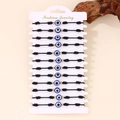 Set di 12 braccialetti intrecciati con malocchio perline blu e accenti dorati su scheda - Braccialetti Corda Nera Occhio Singolo