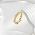 Macro detail of gold eternity ring featuring micro-pave setting with sparkling zircons - US 5 / Gold (Full Rhinestone)