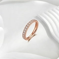 Close-up of rose gold titanium ring with pavé set cubic zirconia stones on white background - US 5 / Rose Gold (Full Rhinestone)