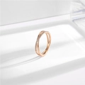 Elegant rose gold criss-cross titanium steel ring with micro-pave cubic zirconia stones - US 5 / Rose Gold