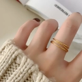 Minimalist gold titanium steel layered ring with multi-layered cross design for women - US 6 / Gold