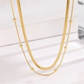 Double-layered gold titanium steel necklace with flat snake chain and beaded strand - Double Layer Round Bead Layered Style