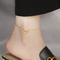 Elegant gold bow pendant anklet featuring bead details and minimalist steel chain - Hollow Bowknot Style / Gold