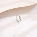 Minimalist silver flower ring with a single diamond inlay and delicate polished band - US 6 / Silver