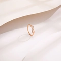 Elegant rose gold bow ring with sparkling rhinestones on textured fabric background - US 6 / Rose Gold