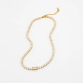 Golden tennis chain necklace with white cubic zirconia and emerald-cut center stone - Necklace (CK1982) / White