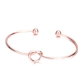 Detail of rose gold knot bangle with smooth metallic finish and sphere end caps - Alloy Rose Gold (S0047)