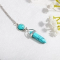 Detail of bohemian turquoise hexagonal bullet pendant necklace with silver metal setting - Blue (N0283)