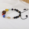 Detail of natural stone beads and solar system charms on a woven braided bracelet - Eight Planets Style (B0027)