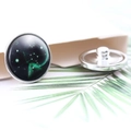 Detail of silver zodiac cufflinks with green star constellation glass dome and T-back clasp - Diameter 20MM / Sagittarius Style (P0975)