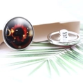 Macro view of 20mm Leo zodiac snap button with glass dome and metal base structure - Diameter 20MM / Leo Style (P0975)