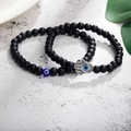Detail of matte black beads with blue evil eye and silver hand of Fatima charms - Hamsa Hand Evil Eye Set (B2693) / Two-Piece Set / Matte Black