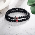 Detail of matte black beads with silver Hamsa Hand and red Evil Eye charms set - Matte Hamsa Red Eye Style (B2694) / Two-Piece Set