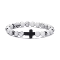 Detailed close-up of white marble stone beads and black cross pendant on elastic bracelet - White Turquoise Cross Style