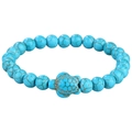 Natural turquoise bead bracelet with a detailed turtle charm on a white background - Turquoise Turtle (B3557)