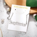 Detail of a Sagittarius stainless steel pendant necklace on a premium display card - Sagittarius-Silver