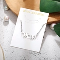 Detailed view of silver stainless steel Virgo zodiac pendant necklace on white display card - Virgo-Silver