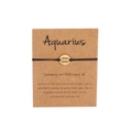 Handmade woven black rope Aquarius bracelet with golden zodiac charm on card - Gold Aquarius (B0833)