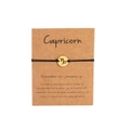 Handmade Capricorn constellation woven bracelet with gold charm on display card - Gold Capricorn (B0850)