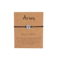 Adjustable black rope Aries zodiac bracelet with silver pendant on a display card - Silver Aries (B0820)