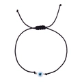 Dettaglio del bracciale regolabile in corda nera con malocchio blu e perline distanziali argento - Stile Cordino Nero Singolo