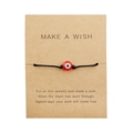 Bracciale occhio portafortuna rosso su un biglietto regalo Make a Wish in kraft - Occhio del Male Rosso Corda Nera (B2553)