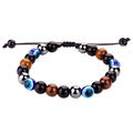 Gros plan détaillé du bracelet Evil Eye en perles d'oeil de tigre et cordon tressé - Style Oeil de Tigre Jaune Tissé (B3113)