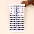 Set van 12 zwarte geweven Evil Eye armbanden met gouden kralen op displaykaart - Zwarte Touw Boze Oog Gevlochten Armband (Stijl 3) / 12-delige Set / Zwart
