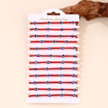 Set di 12 braccialetti rossi intrecciati malocchio fatti a mano con perline blu su carta - Braccialetti Quattro Occhi Corda Rossa