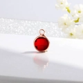 Deep red round faceted birthstone pendant with rose gold plated metal frame and loop - Rose Gold-Dark Red (January)
